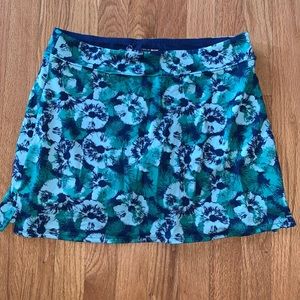 Skirt with built in shorts. Navy blue, mint and emerald pattern.